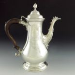 A George III silver coffee pot, John King, London 1769, footed baluster form, with cast Rococo shell