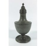 A 19th century pewter shaker