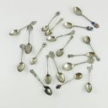 A collection of silver and enamelled souvenir spoons