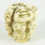 λ A Japanese carved ivory pommel