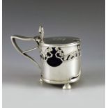 Kate Harris for William Hutton, London 1902, an Arts and Crafts silver mustard pot, cylindrical form