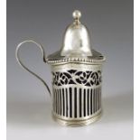 DWR, Amsterdam 1780, a Dutch silver mustard pot, straight sided oval form, reticulated and bright cu