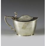 Stokes and Ireland, Chester 1903, an Edwardian silver mustard pot, plain boat form with gadrooned ri