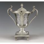 D Garreau, Paris circa 1830, a French Empire style silver mustard pot, twin handled pedestal urn for