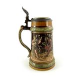 Christian Warth for Mettlach, Villeroy and Boch, a half litre stein, incised forest drinkers