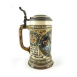 Fritz Quidenus for Mettlach, Villeroy and Boch, a half litre stein, incised tavern waitress scene