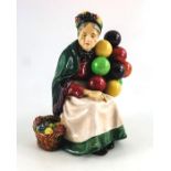 An early Royal Doulton earthenware figure, Old Balloon Seller