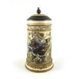 Mettlach, Villeroy and Boch, a half litre stein, incised with Gambrinus in a garden with verse above