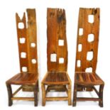 A contemporary rusticated driftwood dining set of eight chairs and table