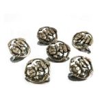 A set of six Arts and Crafts silver buttons, Reynolds and Westwood
