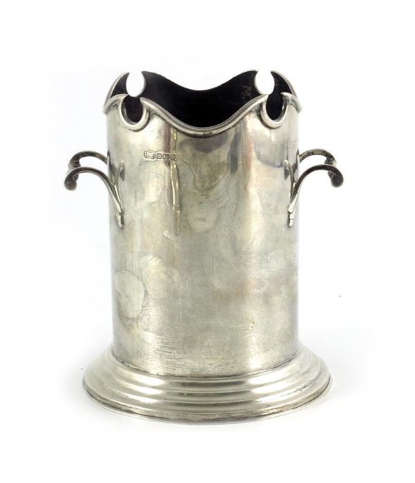 An Edwardian silver wine bottle holder, Richard Richardson, Sheffield 1906, sleeve form with twin ha