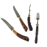 Two pairs of Oriental horn handled knives and forks