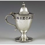 Wakely and Wheeler, Dublin 1917, a George V Irish silver mustard pot, Neoclassical urn form, reticul