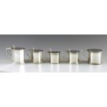Five English silver mustard pots, 1908 - 1920, various makers, Chester & Birmigham, of plain drum an