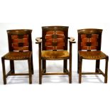 Five Arts and Crafts leather and oak chairs