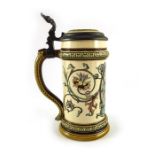 R Buch for Mettlach, Villeroy and Boch, a half litre stein, printed under glaze with man smoking