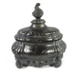 An 18th century Rococo pewter bombe sugar box and cover