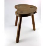 Robert Mouseman Thompson of Kilburn, an Arts and Crafts oak cow stool