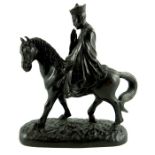 A Chinese bronze figure of a religious man on horse