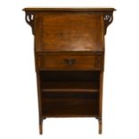 An Arts and Crafts oak bureau bookcase