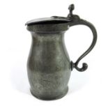 An 18th century pewter measure