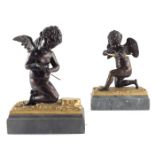 A pair of 19th century bronze and ormolu figures of winged putti