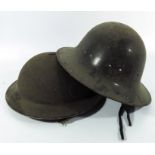Two World War Two era helmets