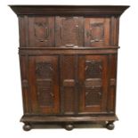 A part 17th century style Dutch panelled oak cupboard