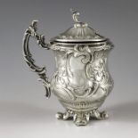 H & L, Paris circa 1890, a French silver mistard pot, double ogee balsuter form, embossed with folia