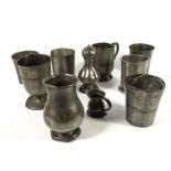 A collection of 18th and 19th century pewter beakers
