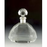 A French Art Deco silver mounted glass decanter