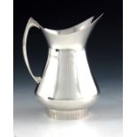 Eric Clements for Mappin and Webb, a Modernist silver jug, Sheffield 1973