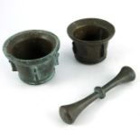 Two 17th century Spanish bronze mortars and a pestle