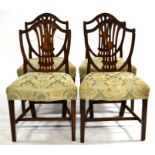 Four George III mahogany Hepplewhite design dining chairs