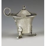 A E Jones, Birmingham 1907, an Arts and Crafts silver mustard pot, planished, flared trumpet form on