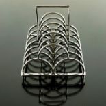 Christopher Dresser for James Dixon and Son, a silver plated six division toast rack, model 67