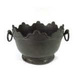 An 18th century pewter Monteith wine cooler