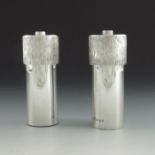 Christopher Lawrence, a pair of Modernist silver salt and pepper grinders