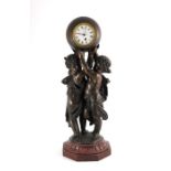 Albert Ernest Carrier, a bronze pedestal clock