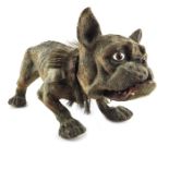 A French papier mache toy growling bulldog