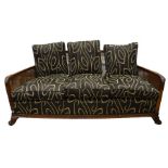 A French Art Deco walnut three piece double bergere suite