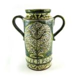 W Warwick for Della Robbia, an art pottery twin handled vase