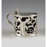 John Wakely and Frank Wheeler, London 1911, a George V silver mustard pot, cylindrical form, reticul