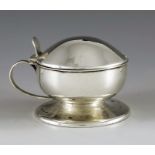 Liberty and Co., Birmingham 1908, an Arts and Crafts silver mustard pot, squat pedestal form with do