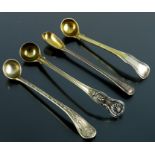 Four William IV and Victorian silver long condiment spoons