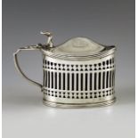 Stokes and Ireland, Chester 1904, an Edwardian silver mustard pot, straight sided oval form, reticul