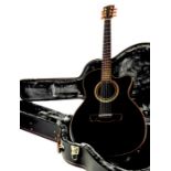 A Merida Extrema Diana acoustic guitar