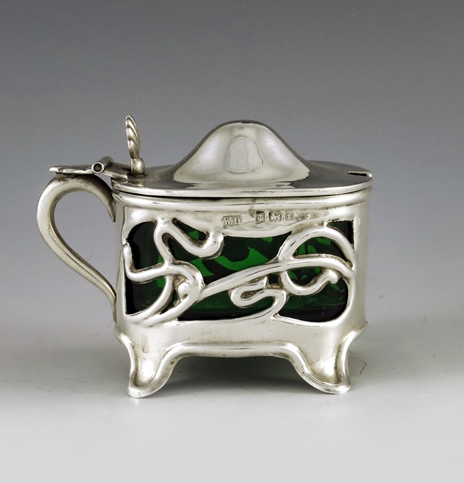 William Devenport, Birmingham 1905, an Arts and Crafts silver mustard pot, oval cylinder form, retic