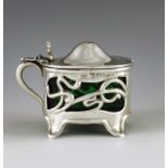 William Devenport, Birmingham 1905, an Arts and Crafts silver mustard pot, oval cylinder form, retic