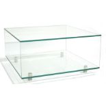 A contemporary Glassdomain glass coffee table
